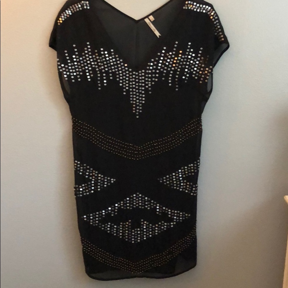 Black and sequined dress
